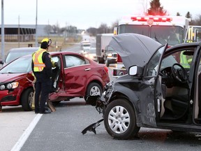 Emergency crews at the scene of a two-vehicle collision on Manning Road directly on top of the Hey. 401 overpass November 27, 2018. Two persons were assisted by Essex-Windsor EMS paramedics with minor injuries.  The mishap caused a long backup of traffic on southbound Manning Road.