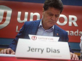 Unifor President Jerry Dias arrives for the union press conference at Local 222 in Oshawa, Ontario, on November 26, 2018. - In a massive restructuring, US auto giant General Motors announced Monday it will cut 15 percent of its workforce to save $6 billion and adapt to "changing market conditions." The moves include shuttering seven plants worldwide as the company responds to changing customer preferences and focuses on popular trucks and SUVs and increasingly on electric models.  GM will shutter three North American auto assembly plants next year: the Oshawa plant in Ontario, Canada; Hamtramck in Detroit, Michigan and Lordstown in Warren, Ohio.