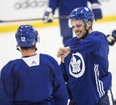 Maple Leafs’ Auston Matthews gives Patrick Marleau the thumbs down during practice on October 26, 2018. (CRAIG ROBERTSON/TORONTO SUN)