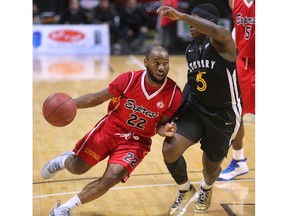 WINDSOR, ON. NOVEMBER 28, 2018. --  Horace Wormely, left, of the Windsor Express drives a past by Braylon Rayson of the Sudbury 5 during their game on Wednesday, November 28, 2018, at the WFCU Centre in Windsor, ON.