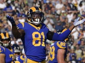 Los Angeles Rams tight end Gerald Everett celebrates after scoring during the first half in an NFL football game against the Seattle Seahawks Sunday, Nov. 11, 2018, in Los Angeles.