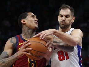Cleveland Cavaliers guard Jordan Clarkson (8) is fouled by Detroit Pistons guard Jose Calderon (81) during the second half of an NBA basketball game, Monday, Nov. 19, 2018, in Detroit.