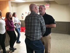 Caesars Windsor security manager Curtis Holden (far right) conducts an exercise on personal space with a Brentwood Recovery Home staff member on Nov. 13, 2018. Caesars Windsor is donating Holden's time to offer non-violent crisis intervention training to Brentwood staff.