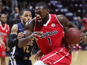 Maurice Jones, left, of the St. John's Edge pressures Juan Pattillo of the Windsor Express during their game on Wednesday at the WFCU Centre.