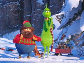 This image released by Universal Pictures shows the characters Bricklebaum, voiced by Kenan Thompson, left, and Grinch, voiced by Benedict Cumberbatch, in a scene from "The Grinch." (Universal Pictures via AP) ORG XMIT: NYET226