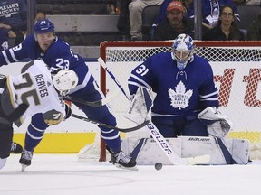 Golden Knights forward Ryan Reaves (75) gets a shot off at Maple Leafs goaltender Frederik Andersen (31) during third period NHL action in Toronto on Tuesday, Nov. 7, 2018.