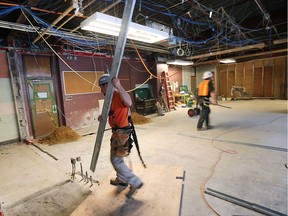 Construction workers are shown at W. F. Herman Secondary School in Windsor on Wednesday, Jan. 20, 2016 building new classrooms.