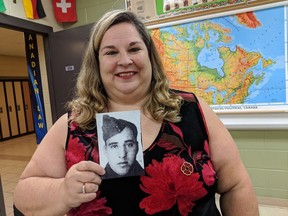 Mary Bradatanu, shown Nov. 9, 2018, holds a photo of her uncle, Gerald James Jelso, who was killed during the Dieppe Raid in the Second World War. Bradatanu learned more about her uncle from students at St. Anne Catholic High School, who researched members of the Essex and Kent Scottish Regiment.