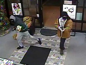 Security camera images of two armed and masked robbers who targeted Phoenix Jewellers at 4124 Walker Rd. in Windsor on the evening of Nov. 13, 2018.