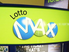 A Lotto MAX sign at a ticket seller in Windsor is shown in this 2016 file photo.