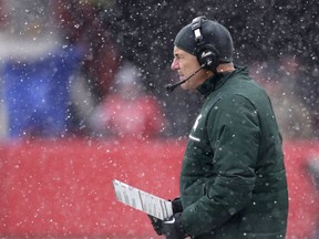 Michigan State head coach Mark Dantonio follows the second half of an NCAA college football game against Nebraska in Lincoln, Neb., on Nov. 17, 2018. Nebraska won 9-6.