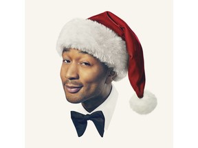 This cover image released by Columbia Records shows "A Legendary Christmas," a holiday album by John Legend. (Columbia Records via AP)