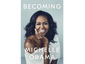This cover image released by Crown shows "Becoming," by Michelle Obama. Crown Publishing told The Associated Press on Friday that the former first lady's memoir had sold more than 725,000 copies after its first day of publication. "Becoming" came out Tuesday, the same day Obama launched a national book tour. (Crown via AP)