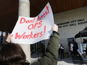 A participant in a Windsor Overdose Prevention Society sponsored rally is shown in front of City Hall on Nov. 23, 2018. The gathering was held to show community support, and demonstrate the need, for an overdose prevention site in the city.