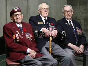 Ralph Mayville, Jim Summersides and Jack Callowhill pose for a photo at the Canadian War Museum in Ottawa Wednesday Nov 21 2018. These three Canadian veterans from the Second World War First Special Service Force -- the Devil's Brigade -- were on hand to receive the Congressional Gold Medal from the U.S. government Wednesday.