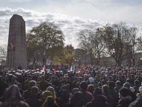 Community members gather for the Remembrance Day ceremony at the cenotaph in downtown Windsor on Nov. 11, 2018.