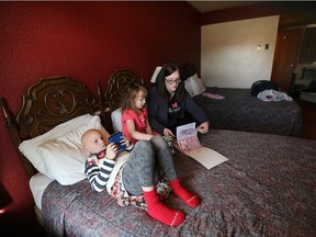 Lady Laforet, executive director of The Welcome Centre Shelter for Women in Windsor is shown with her children Lelaina, 7, and Delilah, 5, on Wednesday, Nov.r 21, 2018, at city motel. She is spending two nights in the room with her kids in an effort to gain a better understanding of the daily challenges the hotel set-up presents to families.