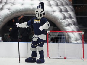 The Skate the Date winter festival kicked off on Tuesday, November 27, 2018, at the University of Windsor. The three day event is sponsored by the Students' Alliance and features all-weather ice skating, a holiday market, holiday themed food and a wrap-up party. The university's mascot "Winston the Lancer" strikes a pose while on the all weather rink.