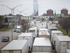Trucks are lined up along northbound Huron Church as they wait to cross the Ambassador Bridge on Wednesday, November 28, 2018.