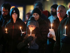 Less than a week after the city was stunned by a sudden surge in drug overdose deaths, approximately 50 people attended a silent vigil in downtown Windsor Nov. 16 to mourn, remember and stand in solidarity with the victims.