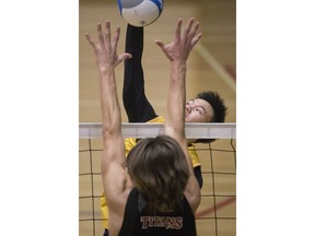 Kennedy's Ler Lar Hay, centre, is seen spiking the ball during play at OFSAA in 2018. He was one of four recruits now set to join the St. Clair Saints.