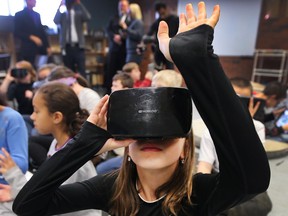 Mira Provenzano, 10, a student at St. Rose Catholic Elementary School in Windsor is shown using a virtual reality unit in the classroom on Monday, November 26, 2018.