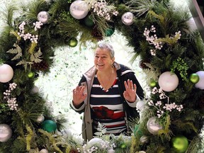 Devonshire Mall visitor Ewa Bago enjoy's the mall's new 'Winter Woodland' Christmas display on Nov. 12, 2018. The new decor will be home this season to Santa Claus, who makes his traditional arrival to the mall by helicopter on Sunday, Nov. 18.