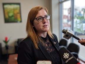 MP Tracey Ramsey speaks to reporters at her office in Essex  following a closed-door meeting there with local officials on Friday, Dec. 14, 2018. Those present discussed licensing issues surrounding the legalization of cannabis and other pot-related topics.