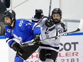 LaSalle Vipers A.J. Ryan, right, tangles with London Nationals Jack Wieringa in first-period action at Vollmer Centre Sunday.