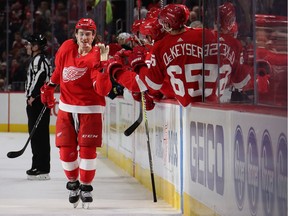 Tyler Bertuzzi of the Detroit Red Wings celebrates his third period goal with teammates while playing the St. Louis Blues at Little Caesars Arena on Nov. 28, 2018 in Detroit, Michigan. Detroit won the game 4-3.