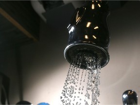 Water flows from a kitchen faucet.