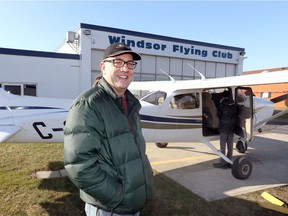 Graham Wilson, chief flight instructor at Windsor Flying Club, prepares to take a family on a sightseeing trip Sunday.  Windsor Flying Club will be celebrating their 75th anniversary in 2019.