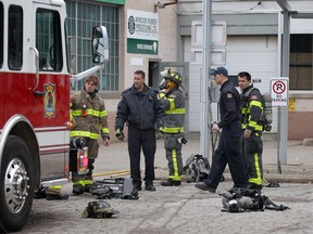 Windsor Fire and Rescue Services firefighters at the scene of a fire at Windsor Rubber Processing Ltd. at 1680 Kildare Road on Dec. 27, 2018. Emergency crews were called out during the noon hour after a machine that shreds rubber overheated, igniting fine fibres in the air. The plant's sprinkler system extinguished a small fire before fire crews arrived. Firefighters spent nearly two hours at the scene, chasing down glowing embers in the rafters of the evacuated industrial facility.