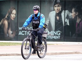 Winter weather to hit the bike trails. Windsor police Const. Ron Grossett pedals along Pitt Street East near Caesars Windsor on Dec. 28, 2018. Friday's balmy temperatures (a high of 13.4 Celsius) had people enjoying the outdoors and patrol officers still reaching for their mountain bikes.