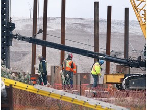 In this Oct. 26, 2018, file photo, workers are shown near the Gordie Howe Bridge International Bridge construction site.