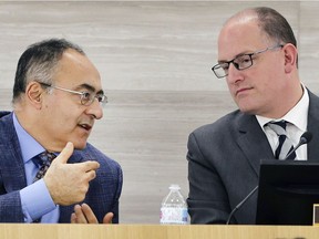 City of Windsor CAO Onorio Colucci, left, speaks to Mayor Drew Dilkens during a council meeting on Dec. 17, 2018.