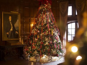 He'd approve. The recently acquired portrait of Willistead Manor's original owner, Edward Chandler Walker, hangs next to a 12-foot Christmas tree in the heritage-designated building's Great Hall on Dec. 21, 2018.