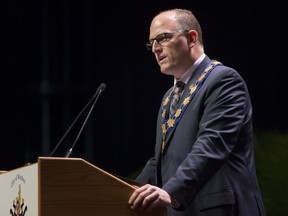 In this Dec. 3, 2018, file photo, Mayor Drew Dilkens gives a speech at the inaugural city council meeting at the St. Clair Centre for the Arts.