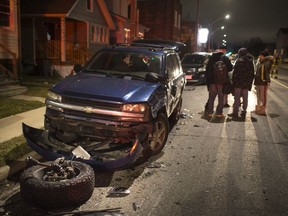 Damaged vehicles littered a stretch of Drouillard Road Friday night after being hit by a Dodge Ram pickup on Dec. 21, 2018. The driver of the pickup, who also crashed into vehicles on Reginald Street, has been charged with impaired driving and fleeing the scene.