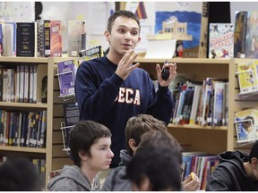 The DECA business team at Sandwich Secondary School shared its knowledge with elementary students at the inaugural Sandwich Family of Schools Financial Literacy Promotion Program on Friday, December 14, 2018 at the LaSalle Public School. The student-led initiative is designed to motivate younger students to begin forming sound habits with the goal of fostering future financial success. Sandwich student Petar Bratic speaks to the students during the presentation.