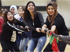 Westview Freedom Academy held a Future Falcon Winter Festival on Dec. 13, 2018. Invited to the holiday-themed event were students from four feeder schools, namely Marlborough, Dougall, Brock and West Gate public schools. Linh Kieu, left, a Grade 5 student from Dougall, gets helping hands in the tug-o-war from Kayla Aquash, centre, and Fatima Azez, both students from Westview.