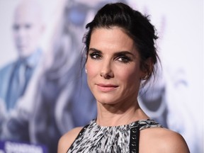 FILE - In this Monday, Oct. 26, 2015 file photo, actress Sandra Bullock arrives at the LA Premiere of "Our Brand is Crisis" held at the TCL Chinese Theatre, in Los Angeles.