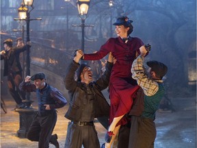 This image released by Disney shows Emily Blunt as Mary Poppins in "Mary Poppins Returns."