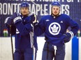 Toronto Maple Leafs Patrick Marleau (left) and Auston Matthews take a break during a practice at the MasterCard Centre in Toronto on Wednesday, December 19, 2018. (Ernest Doroszuk/Toronto Sun)