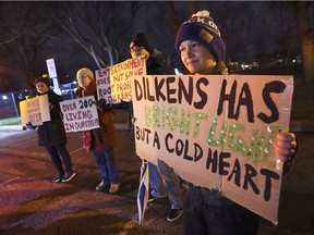 A small group of protesters attended the Bright Lights Windsor Festival at Jackson Park on Dec. 21, 2018. The goal, they said, was to remind visitors to the taxpayer-funded festive site of some of Windsor's social problems, including poverty, homelessness and drug addiction. Shown here are protesters Sofia Baert, left, Dolores Rocha, Roland Rocha and Ocean Connelly.