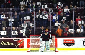 Windsor Spitfire goalie Michael DiPietro is shown during a pre-game ceremony for Mickey Renaud in 2018. The club will pay tribute to the late captain on its media platforms on Thursday due to COVID-19.