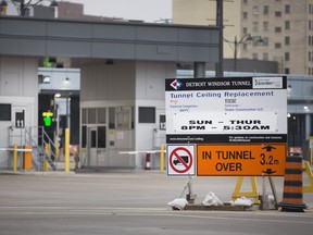 A sign details the restricted hours of the Detroit-Windsor Tunnel due to its ongoing ceiling replacement project. Photographed Dec. 21, 2018.