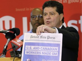 Unifor National President Jerry Dias displays a full page ad the union placed in the Detroit Free Press on Thursday, December 20, 2018, during a press conference at the Unifor Local 444 hall in Windsor. He was commenting on his meeting with General Motors officials in Detroit and the plant closure in Oshawa.