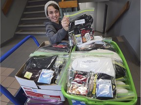 Andi Lin Hudson, 11, is shown at the Downtown Mission on Monday, December 17, 2018, where she delivered more than $500 dollars worth of supplies. The "Keep Warm Project" involved Andi selling her hand made bracelets and raising enough money to purchase gloves, hand warmers, coffee coupons and other supplies for needy individuals. The youngster said that most people take these items for granted but many people need them.
