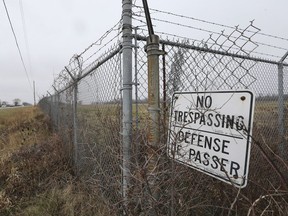 A No Trespassing sign is shown on a fence around the Windsor Airport property near Lauzon Road and County Road 42 on Monday, December 3, 2018. A group who planted trees on the property in that area say their were denied access to care for the trees and shrubs and they have since died.